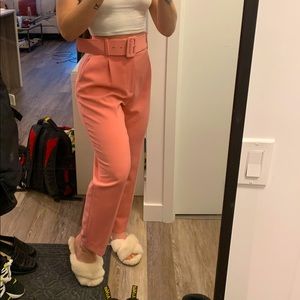 Pink trousers with belt